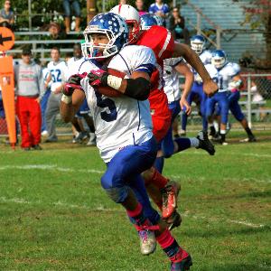 Hawthorne running back Dwayne Miele runs for daylight in his team's loss.